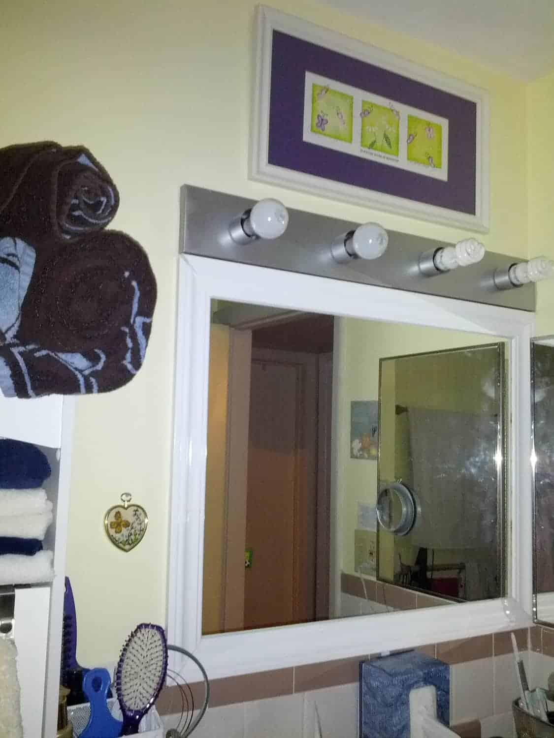 Framing a Mirror http://www.b4andafters.com mirror with white molding around it