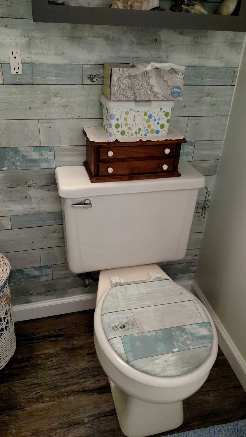 wallpapered toilet lid