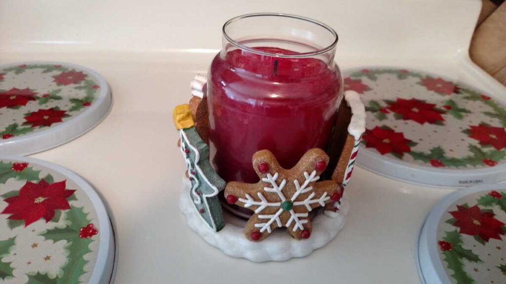 Christmas Stove Burner Covers https://www.b4andafters.com a snowflake on the gingerbread themed large candle holder