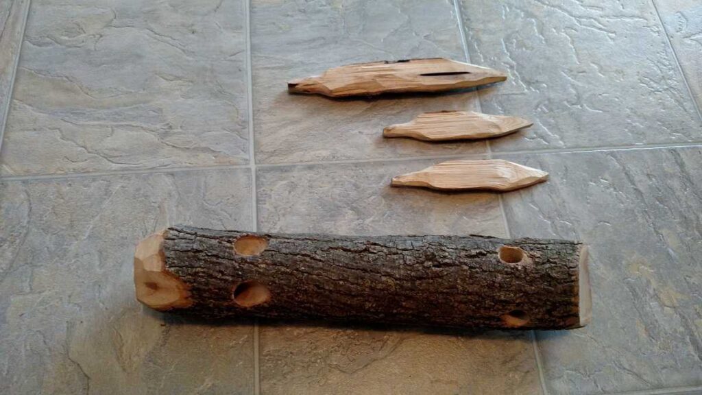 Hand Crafted Rudolph Reindeer https://www.b4andafters.com a small log with holes and 3 other pieces