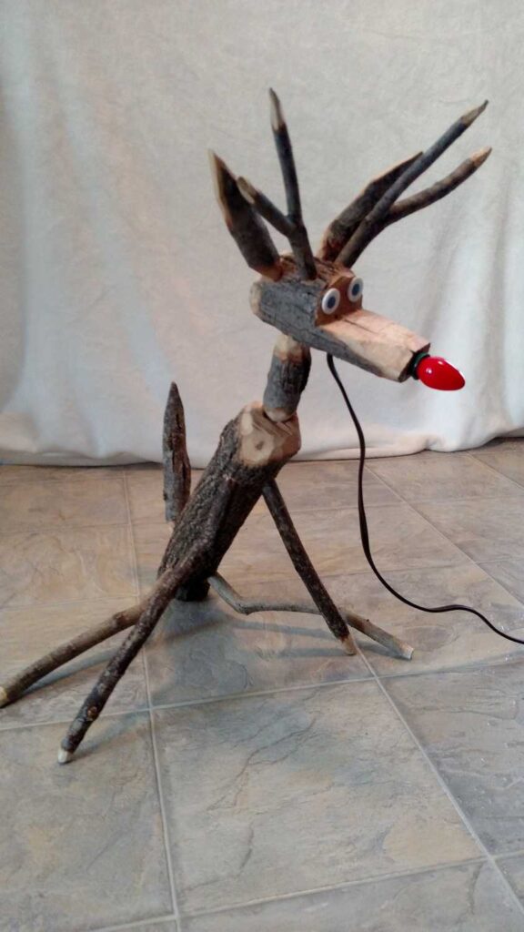 Hand Crafted Rudolph Reindeer https://www.b4andafters.com side view of handmade wooden reindeer