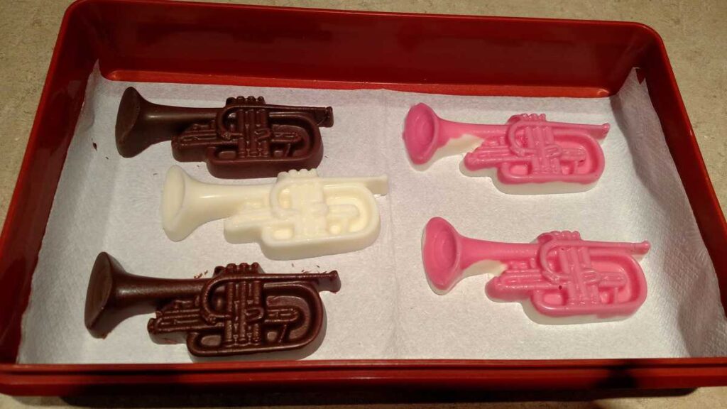 pink, brown, and white chocolate trumpets