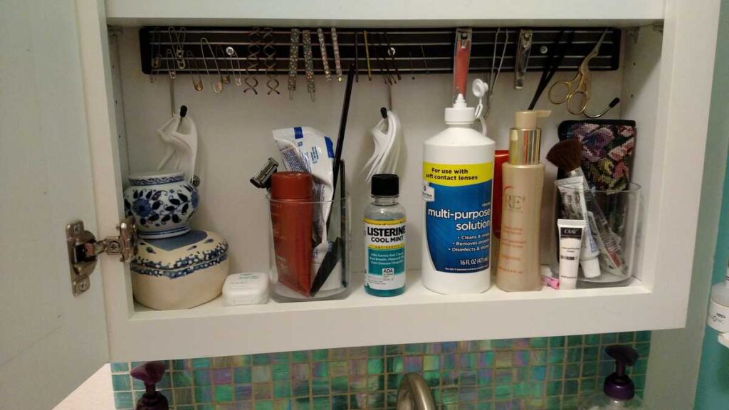 bottom shelf of medicine cabinet