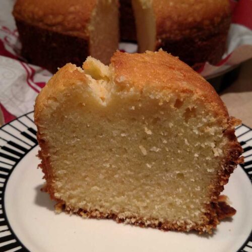 slice of pound cake with cake in background