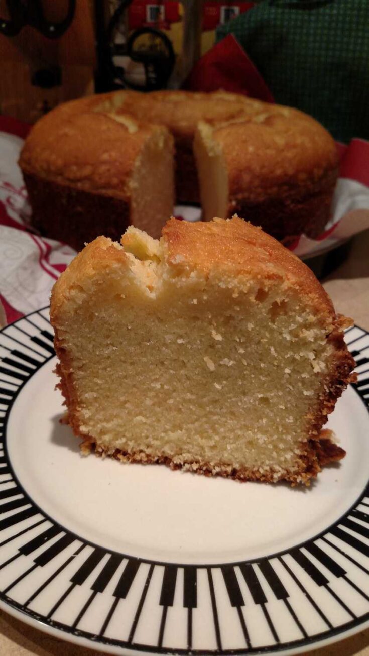 slice of pound cake with cake in background