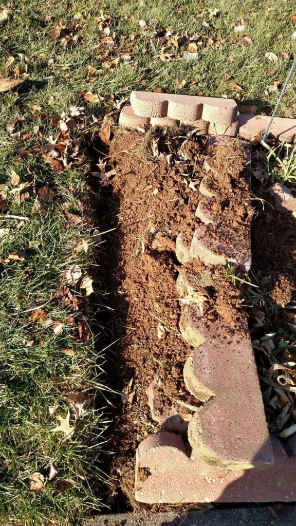 Scalloped Brick Edging http://www.b4andafters.com a dirt trench