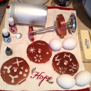 cookie press parts with 4 eggs