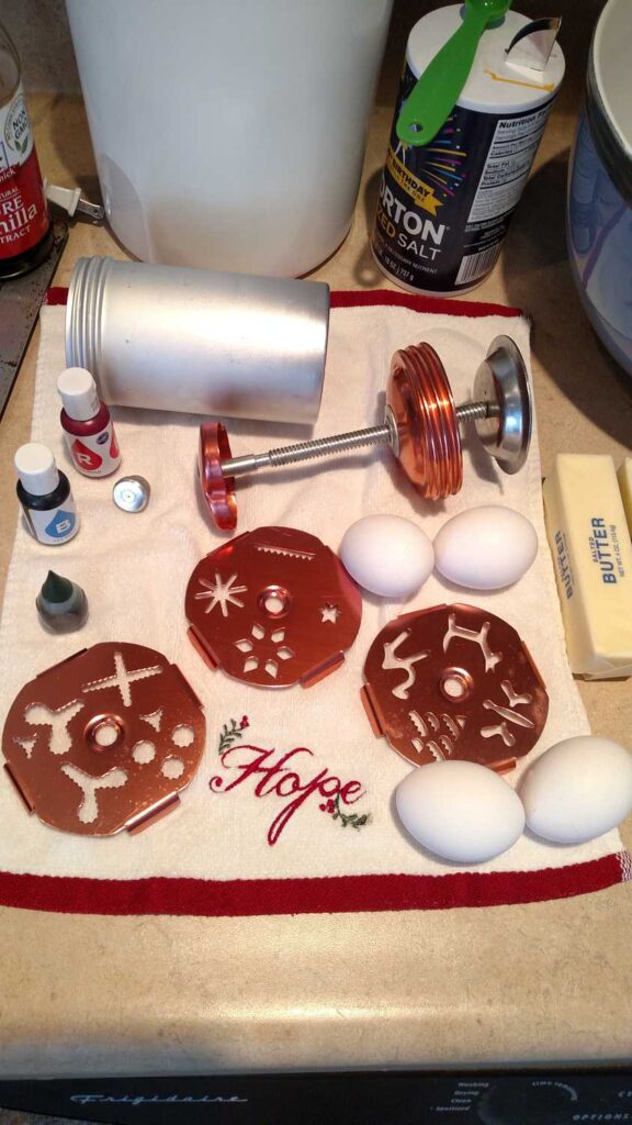 cookie press parts with 4 eggs