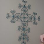 painted blue metal cross