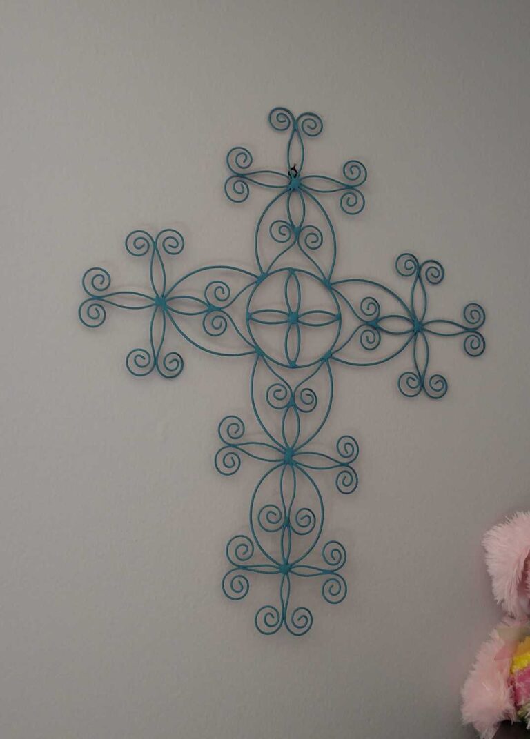 painted blue metal cross