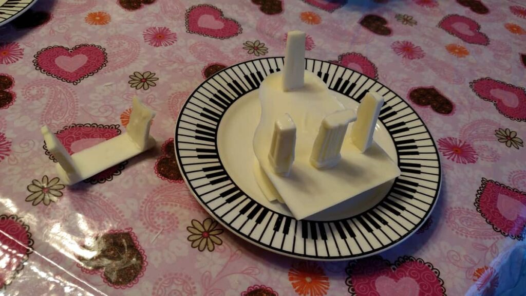 upside down white piano