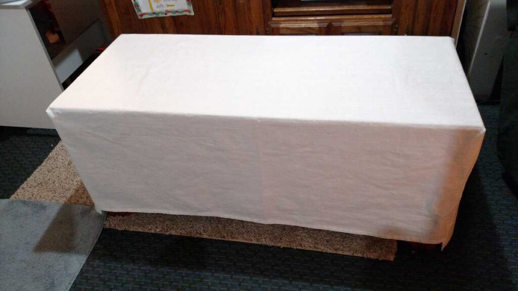 simple white cover on cedar chest