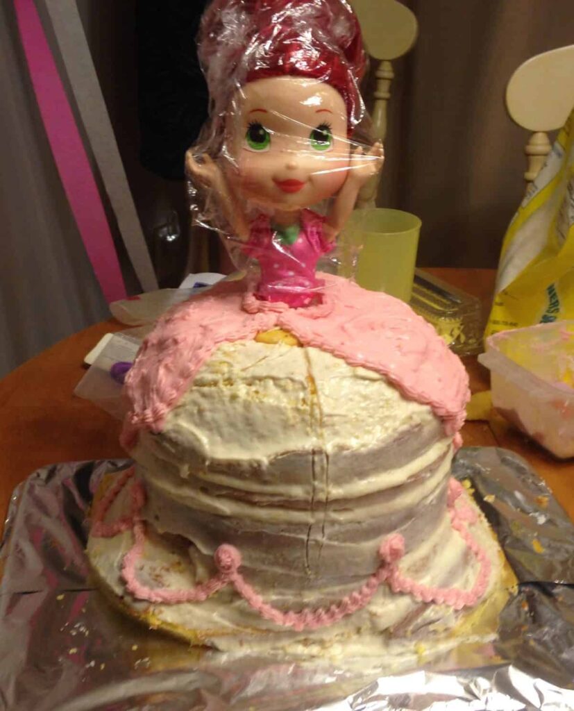Strawberry Shortcake Doll Princess Cake https://www.b4andafters.com strawberry shortcake doll in a cake