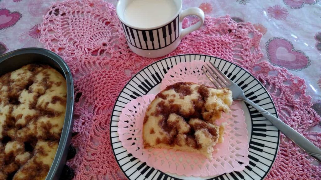 Easy Coffee Cake http://www.b4andafters.com slice of coffee cake against pink background