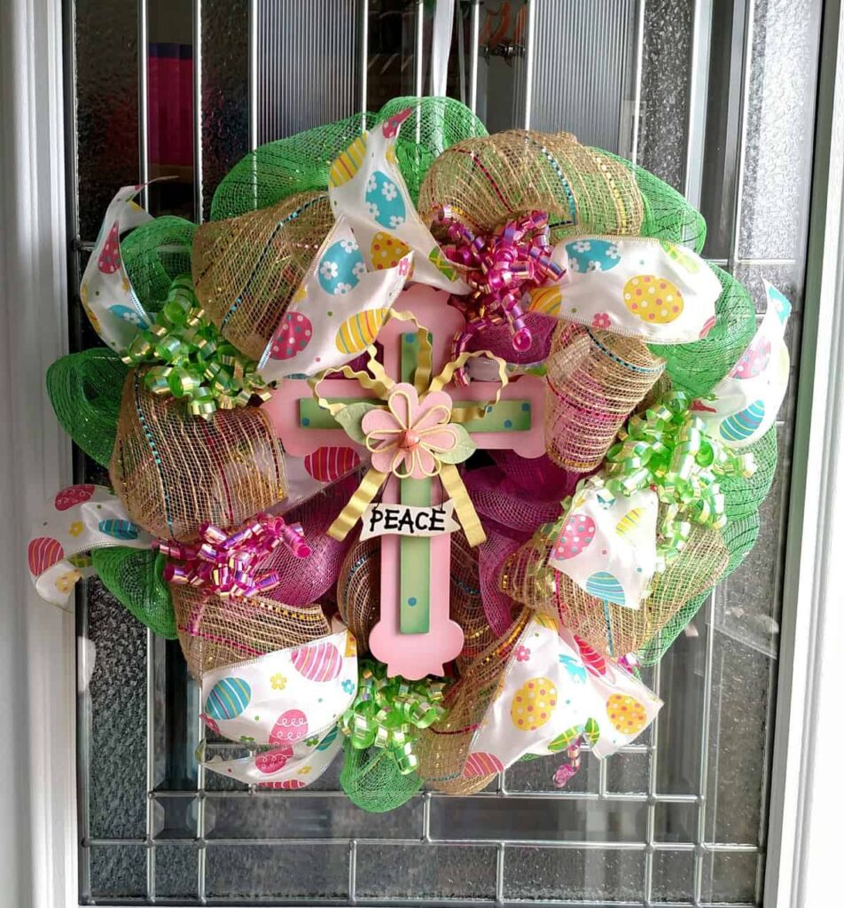 Easter Wreath Made With Dollar Tree Items https://www.b4andafters.com gorgeous Easter wreath with ribbon from the dollar tree