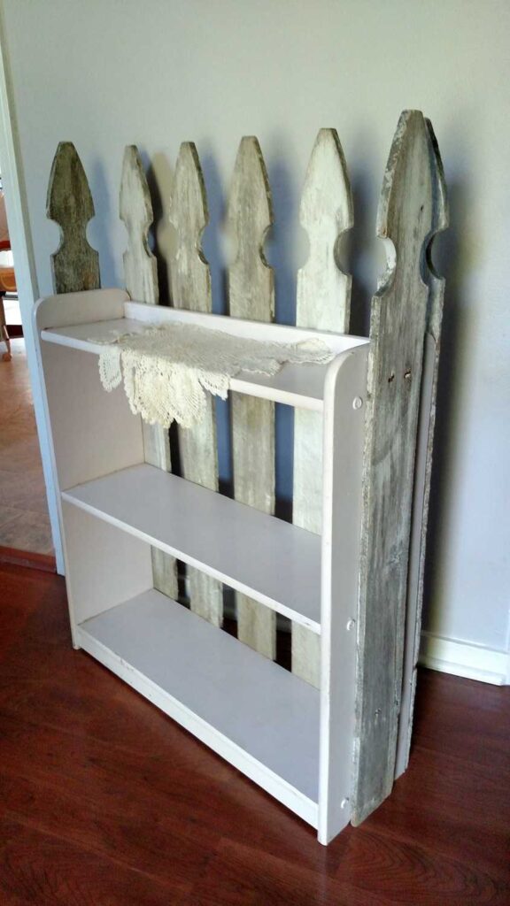 Easy Picket Fence Accent Shelves https://www.b4andafters.com side view of fence pickets added to a bookshelf