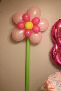 flower balloon on a pool noodle