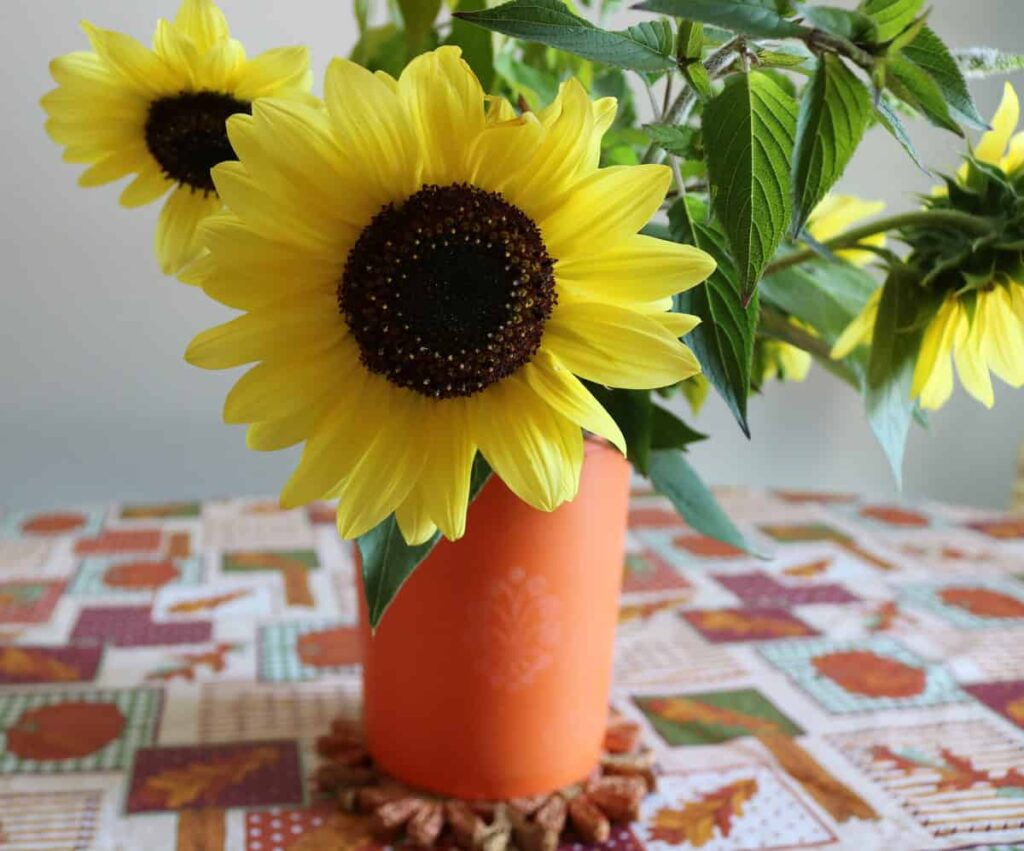 sunflower bouquet in vintage tupperware