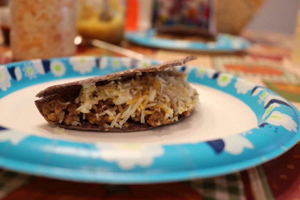 The Right Way to Fill a Taco https://www.b4andafters.com blue corn taco with meet and cheese