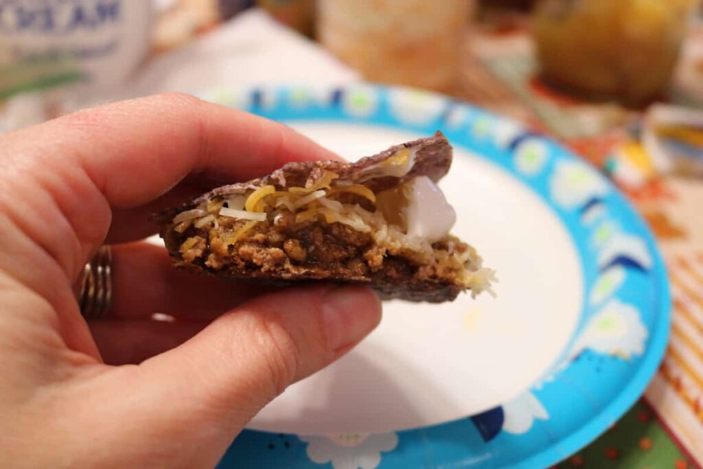 The Right Way to Fill a Taco https://www.b4andafters.com hand holding taco