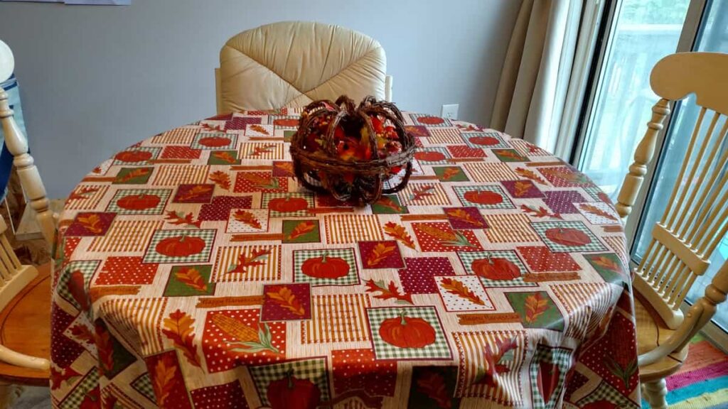 Thanksgiving Kitchen/ Fall Decor https://www.b4andafters.com small kitchen table with fall tablecloth