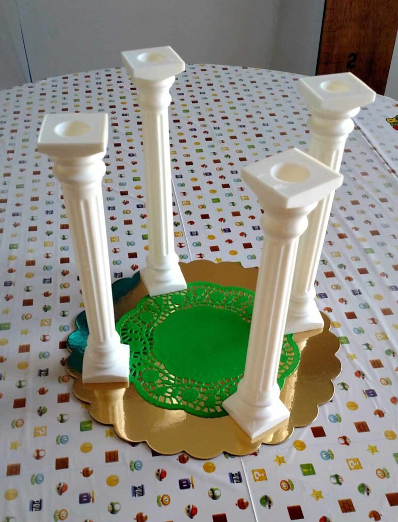 Sword Cake https://www.b4andafters.com pillars to make a cake tall