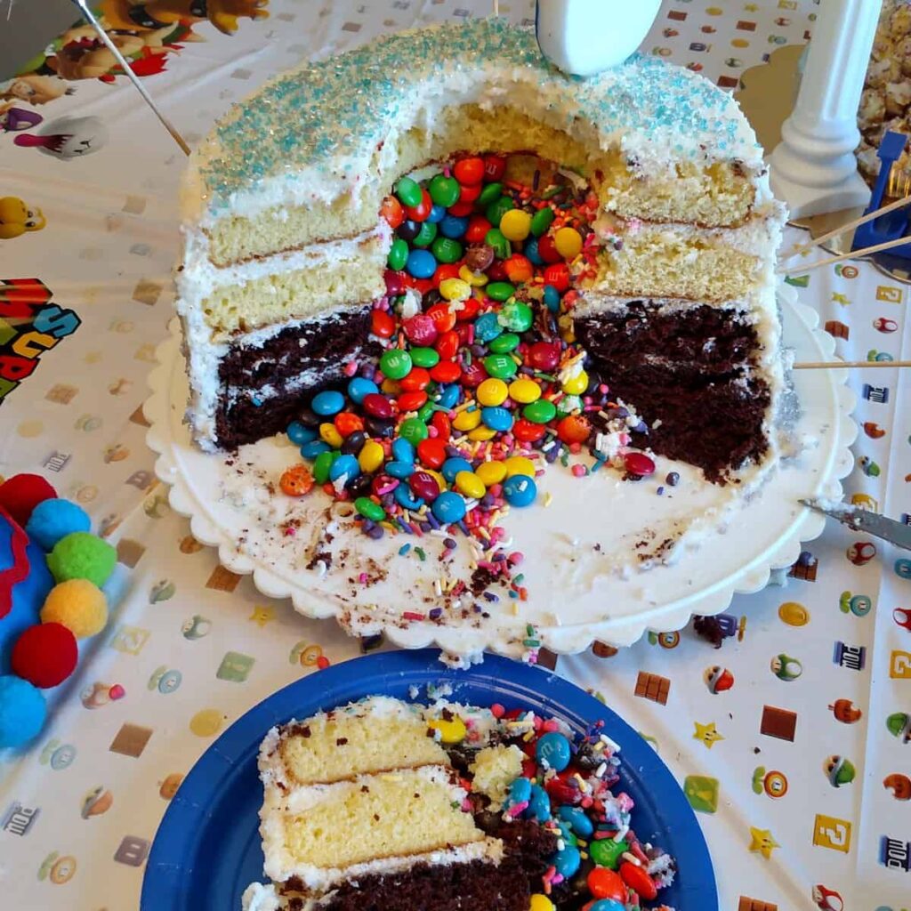 Sword Cake https://www.b4andafters.com cake cut with candy inside