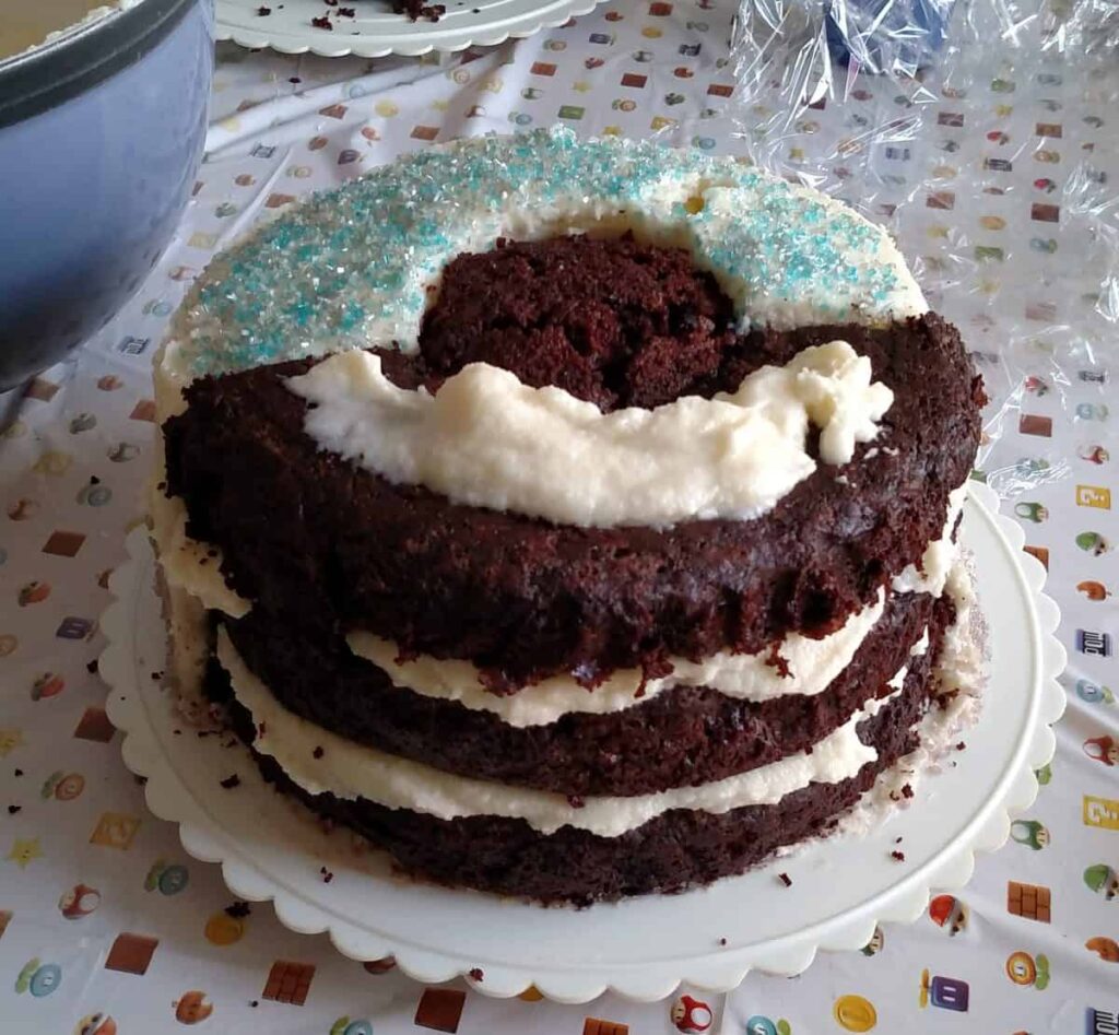 Sword Cake https://www.b4andafters.com partially frosted chocolate cake
