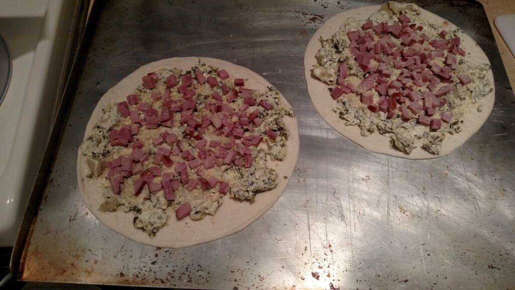 ham and spinach dip on flour tortillas