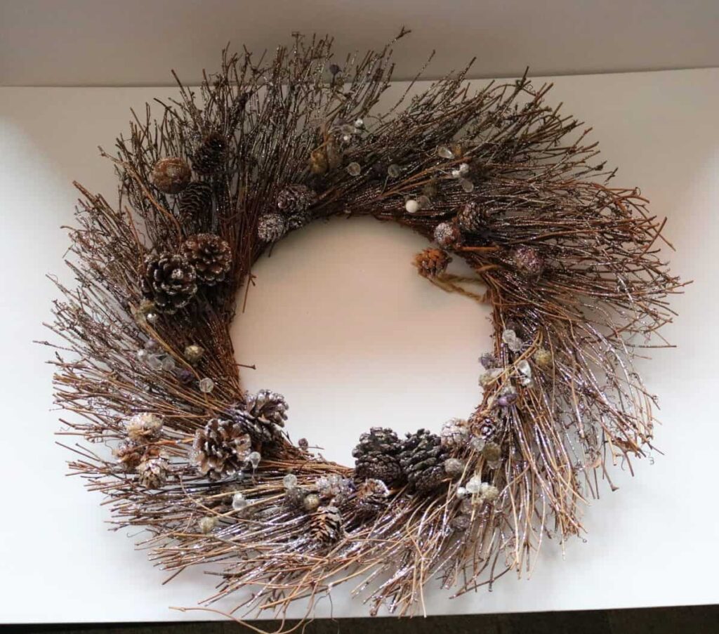 Winter Wreath https://www.b4andafters.com stick wreath with pine cones