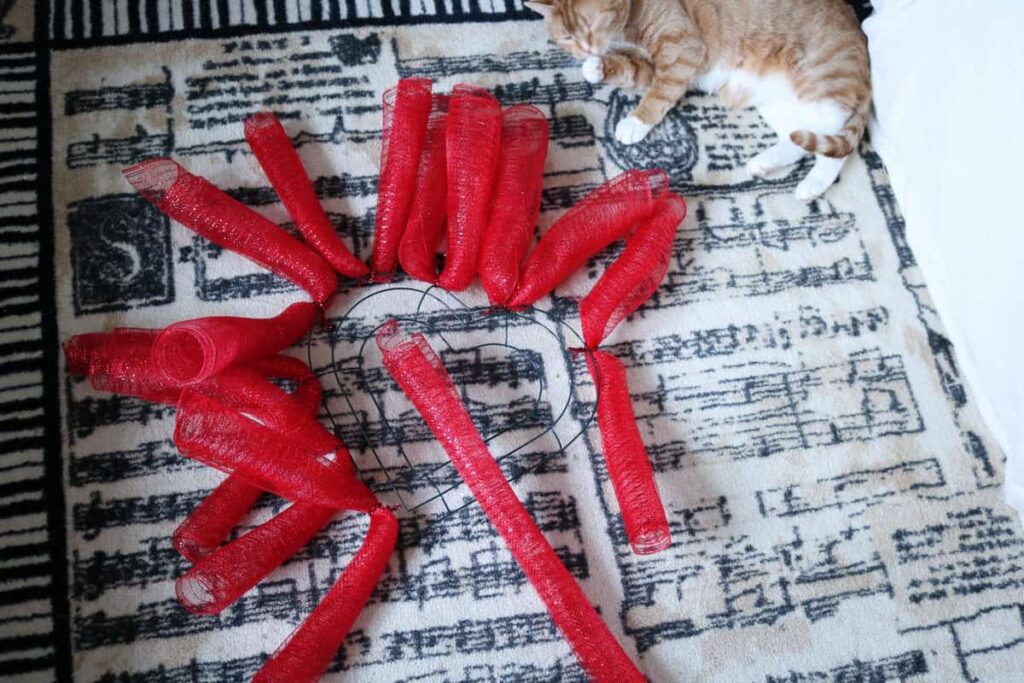 LOVE Sheet Music Wreath https://www.b4andafters.com/love-sheet-music-wreath red deco mesh rolls