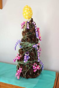 Pine cone tree decorated for Easter