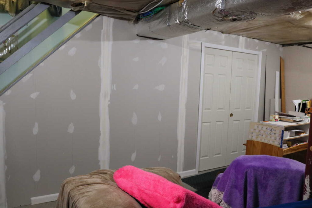 Pocket Doors in Basement Wall https://www.b4andafters.com new drywall in basement