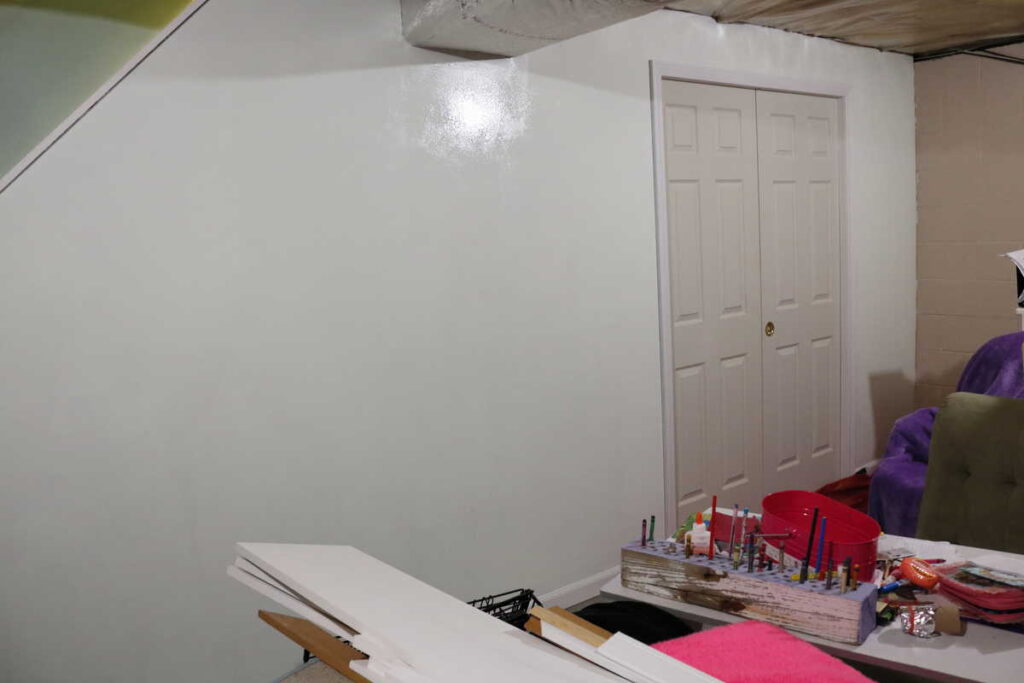 Pocket Doors in Basement Wall https://www.b4andafters.com painting basement wall