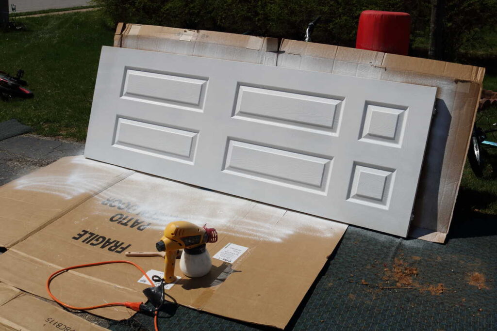 Pocket Doors in Basement Wall https://www.b4andafters.com spray painting pocket doors
