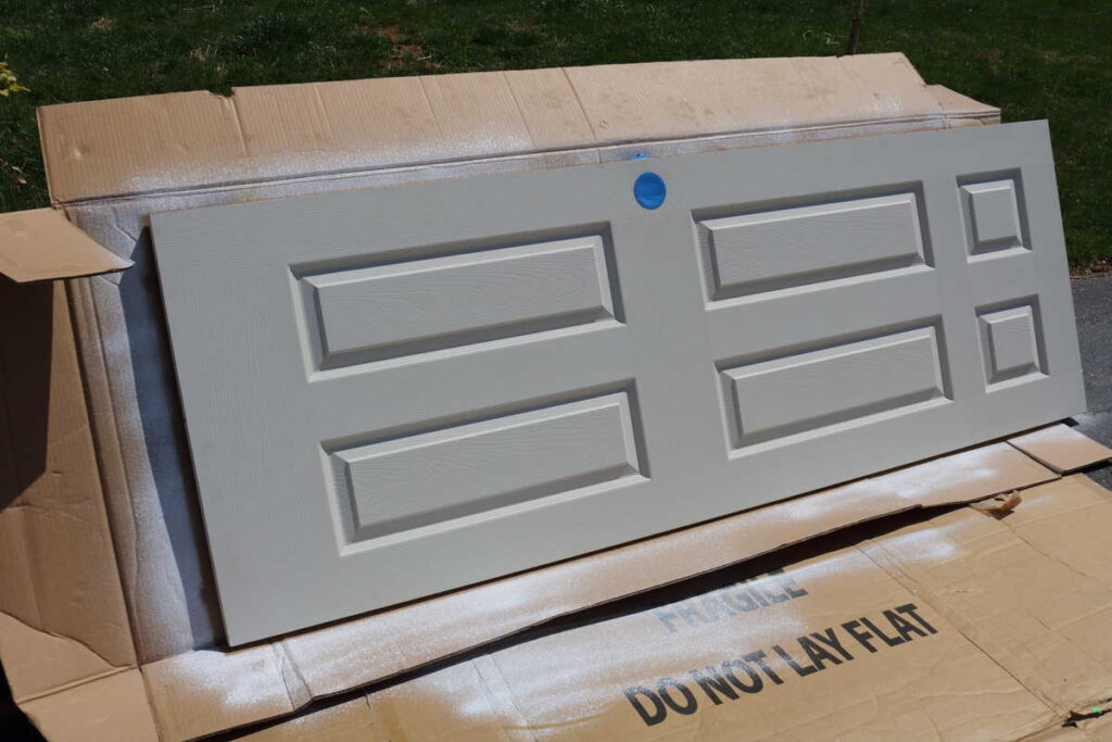 Pocket Doors in Basement Wall https://www.b4andafters.com spray painting pocket doors