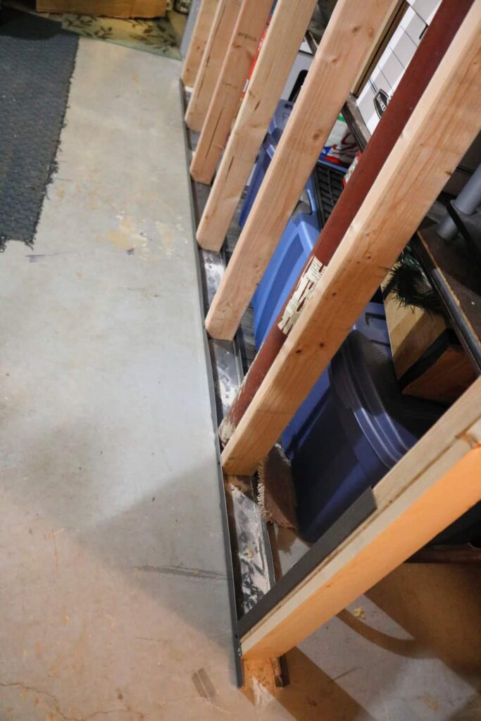 Pocket Doors in Basement Wall https://www.b4andafters.com use metal to frame part of basement wall