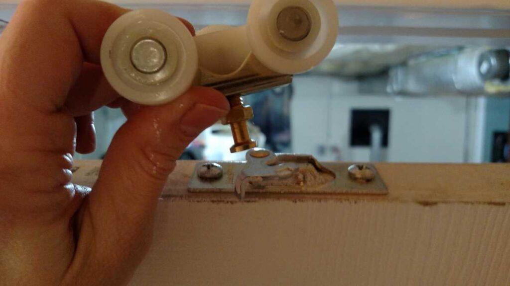 Pocket Doors in Basement Wall https://www.b4andafters.com pocket door mechanism
