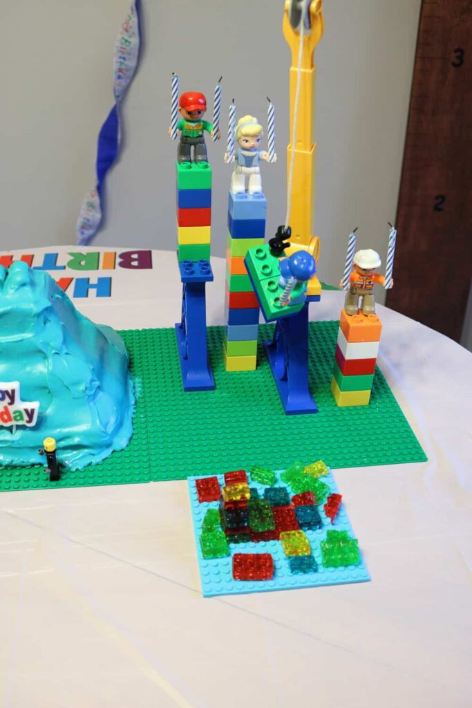 Lego figures holding birthday candles