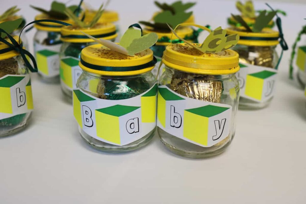 Baby food jars with treats in them all finished https://www.b4andafters.com/Baby-Shower-Favors