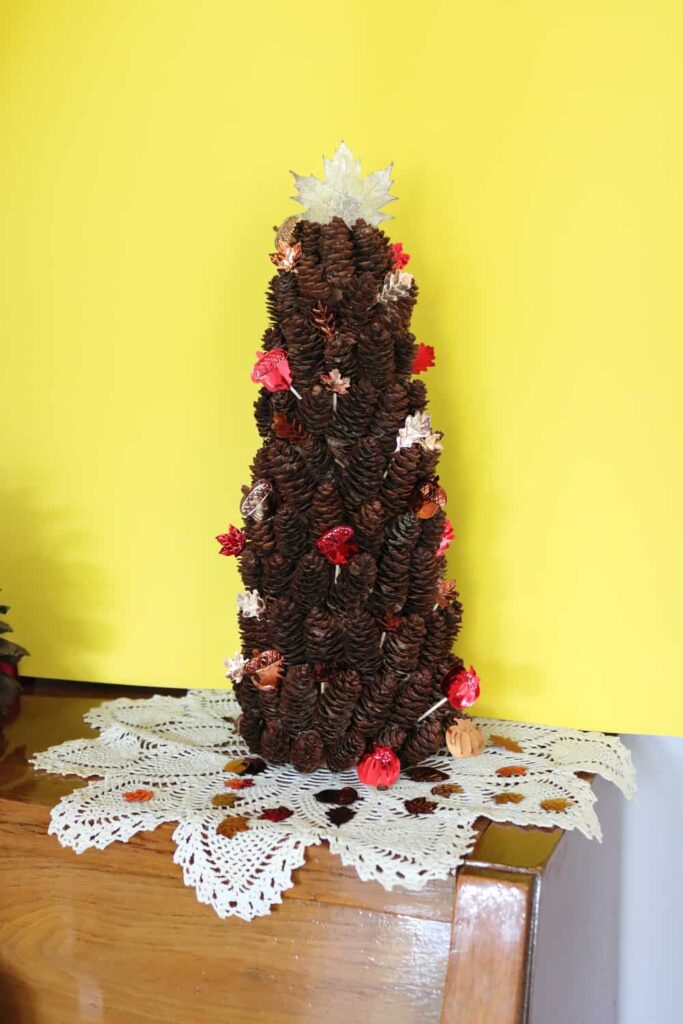 pine cone tree decorated with leaves
