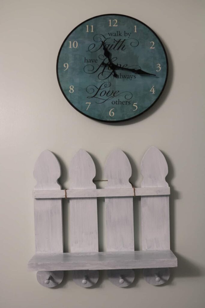 wall shelf with pegs, and clock https://www.b4andafters.com/pet-supply-area