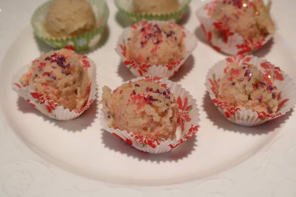 closeup of sugar sprinkles on edible cookie dough