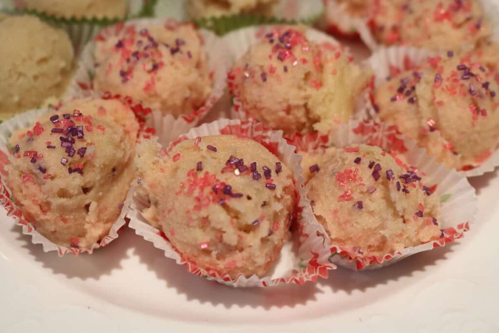 edible sugar cookie dough recipe with pink and purple sprinkles