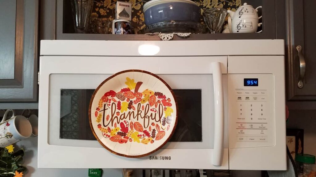 thankful fall paper plate on microwave