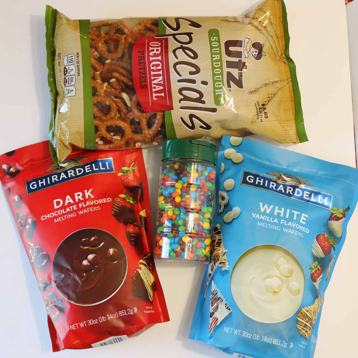 Ghiradelli Dark Chocolate and White Chocolate melting wafers, Utz preztels, and M+Ms