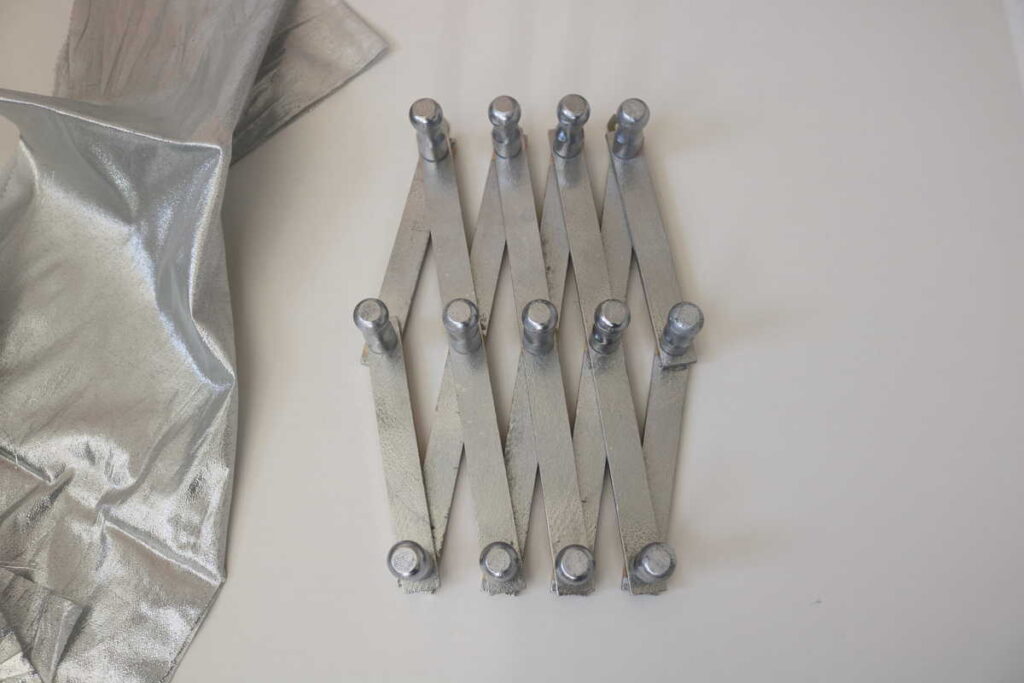 adjustable peg hooks for wall