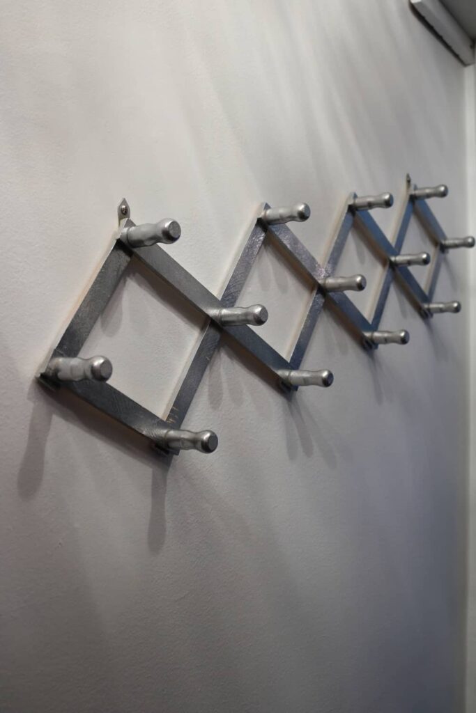 accordion peg wall hooks
