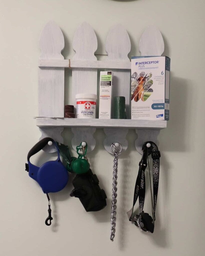 wall peg shelf with animal supplies organized on it https://www.b4andafters.com/pet-supply-area