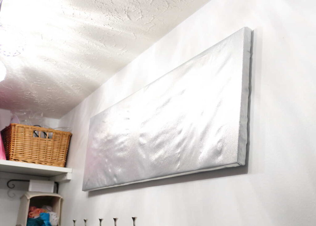 silver fabric covered canvas